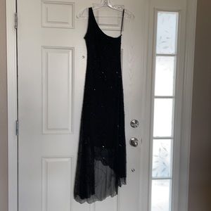 Beautiful black mid-length to long gown.